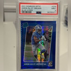2021 Amon-Ra St. Brown Panini Donruss Optic Blue Hyper Rated Rookie Prizm PSA 9